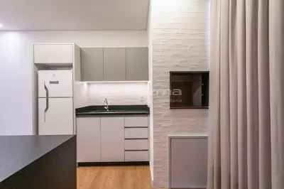 A cozinha ou kitchenette de 402 Flat Moderno e Bem Localizado a 120 metros da praia de Bombinhas Até 4 Pessoas
