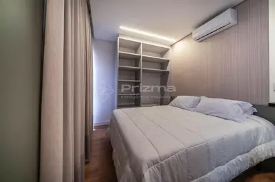 Uma cama ou camas num quarto em 402 Flat Moderno e Bem Localizado a 120 metros da praia de Bombinhas Até 4 Pessoas