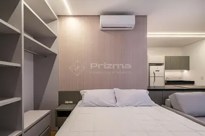 Uma cama ou camas num quarto em 402 Flat Moderno e Bem Localizado a 120 metros da praia de Bombinhas Até 4 Pessoas