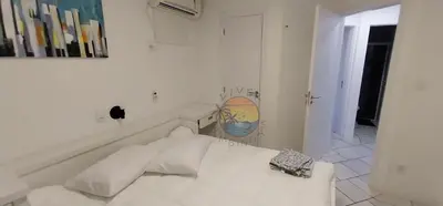 Uma cama ou camas num quarto em Cobertura Zona Central da Praia 02 Dormitórios Ao Lado de Comércio em Geral