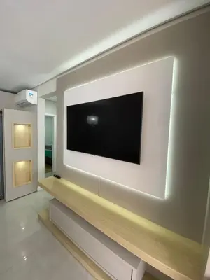 Uma televisão e/ou sistema de entretenimento em Cód 132 - Apartamento aconchegante a 350 metros