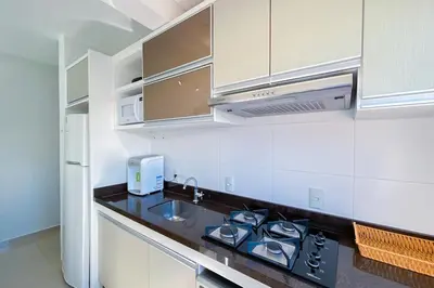 A cozinha ou kitchenette de Praia de Palmas - Conforto e Lazer a 500m do Mar! 0133