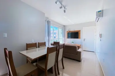 Uma televisão e/ou sistema de entretenimento em Praia de Palmas - Conforto e Lazer a 500m do Mar! 0133