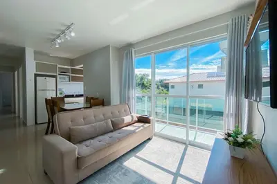 Uma televisão e/ou sistema de entretenimento em Praia de Palmas - Conforto e Lazer a 500m do Mar! 0133
