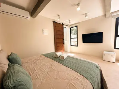Uma cama ou camas num quarto em Refúgio praia natureza mariscal - Baoba Suítes