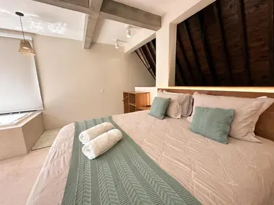Uma cama ou camas num quarto em Refúgio praia natureza mariscal - Baoba Suítes