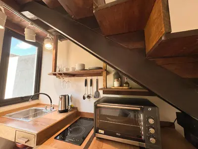 A cozinha ou kitchenette de Refúgio praia natureza mariscal - Baoba Suítes