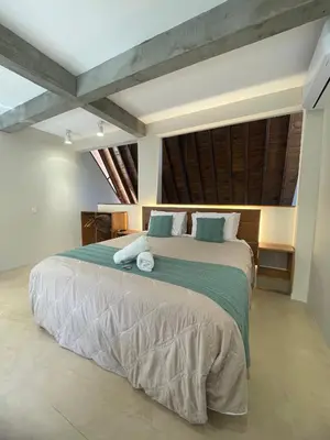 Uma cama ou camas num quarto em Refúgio praia natureza mariscal - Baoba Suítes