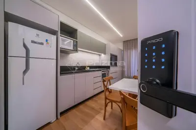 A cozinha ou kitchenette de 414 Flat Moderno e Bem Localizado a 120 metros da praia de Bombinhas Até 4 Pessoas