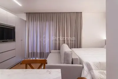 Uma cama ou camas num quarto em 512 Flat Moderno e Bem Localizado a 120 metros da praia de Bombinhas Até 4 Pessoas