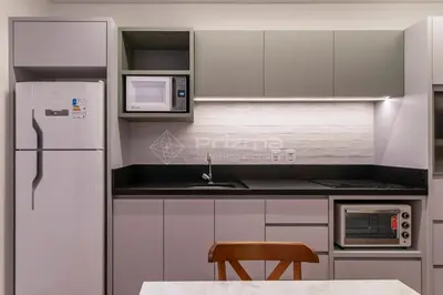 A cozinha ou kitchenette de 512 Flat Moderno e Bem Localizado a 120 metros da praia de Bombinhas Até 4 Pessoas