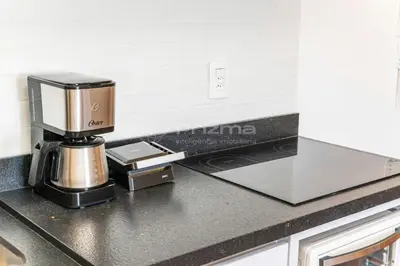 A cozinha ou kitchenette de 515 Flat Moderno e Bem Localizado a 120 metros da praia de Bombinhas Até 4 Pessoas