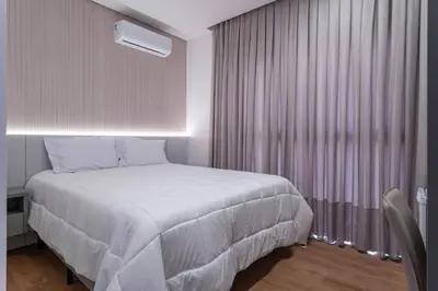 Uma cama ou camas num quarto em 303 Suíte em Localização Incrível Praia de Bombinhas a 120m