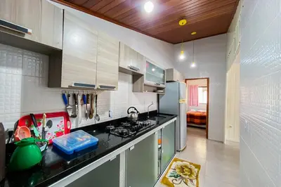 A cozinha ou kitchenette de Espaço e lazer a 750 mtrs da Praia de Palmas! 0140