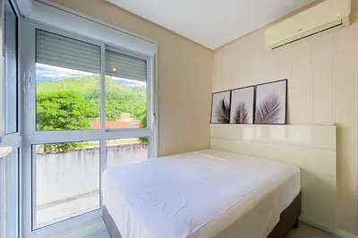 Uma cama ou camas num quarto em Praia de Palmas, 250m do Mar, Ideal para Família, 0194