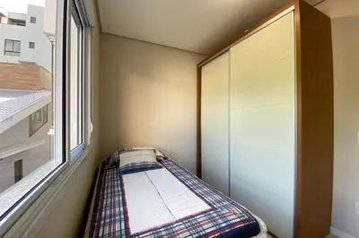 Uma cama ou camas num quarto em Praia de Palmas, 250m do Mar, Ideal para Família, 0194