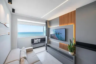 Uma televisão e/ou sistema de entretenimento em Achei Itapema • Sky Bridge Residencial, R.615