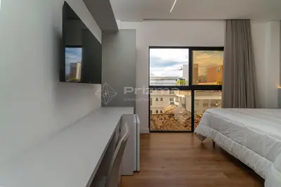Uma cama ou camas num quarto em 308 Suíte em Localização Incrível Praia de Bombinhas a 120m