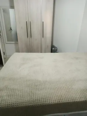 Uma cama ou camas num quarto em Quarto Privado com Ar condicionado e frigobar
