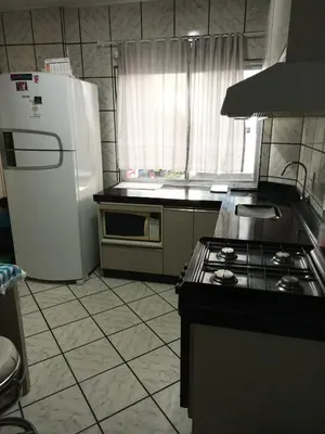 A cozinha ou kitchenette de Quarto Privado com Ar condicionado e frigobar