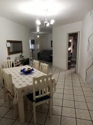 Uma área de estar em Quarto Privado com Ar condicionado e frigobar