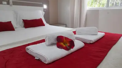 Uma cama ou camas num quarto em Amarra 69 Bombinhas Residence Setor Vintage - Apartamento Familiar no Centro, perto da Praia
