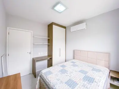 Uma cama ou camas num quarto em Praia de Palmas Apto com Suíte a 450m do Mar 0499