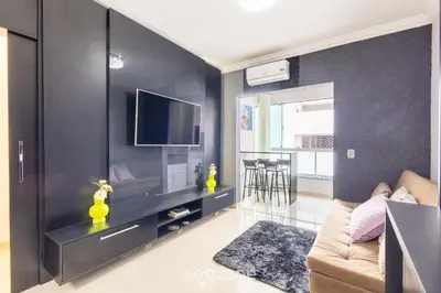 Uma televisão e/ou sistema de entretenimento em Apto 2Q - Churrasq. Garagem Perto da Praia LTL0301