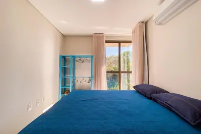 Uma cama ou camas num quarto em Praia de Palmas Conforto a 450m do mar 0193