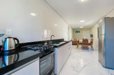A cozinha ou kitchenette de Praia de Palmas Conforto a 450m do mar 0193