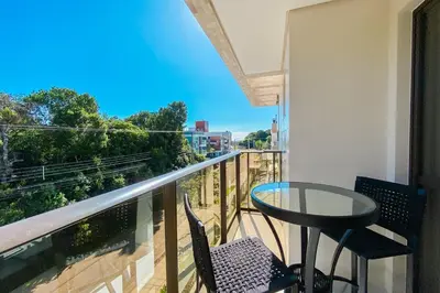 Uma varanda ou terraço em Praia de Palmas Conforto a 450m do mar 0193
