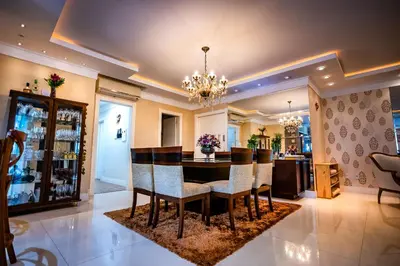 Uma área de estar em Apt 3 en-suites - Meia Praia