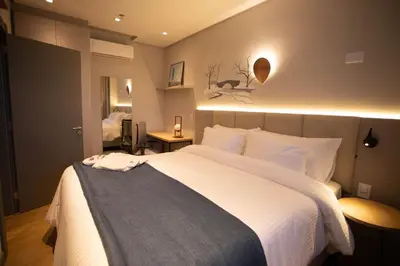 Uma cama ou camas num quarto em Nobile Grand Itapema