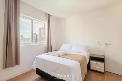 Uma cama ou camas num quarto em Apto 450m da praia c/ churrasq. e 3 suítes TAH0602