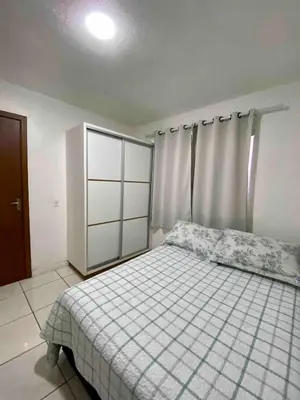 Uma cama ou camas num quarto em Casa Térrea a 200m da Praia de Bombas