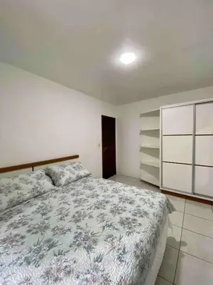Uma cama ou camas num quarto em Casa Térrea a 200m da Praia de Bombas