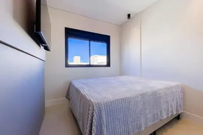 Uma cama ou camas num quarto em Conforto e exclusividade a 60m da Praia de Palmas 0321
