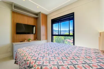 Uma cama ou camas num quarto em Conforto e exclusividade a 60m da Praia de Palmas 0321