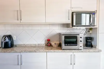 A cozinha ou kitchenette de Apartamento com 03 quartos na Praia! 0331