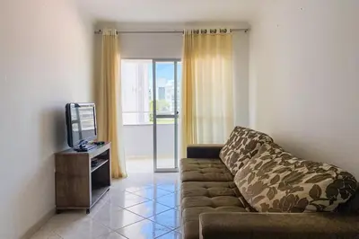 Uma televisão e/ou sistema de entretenimento em Apartamento com 03 quartos na Praia! 0331