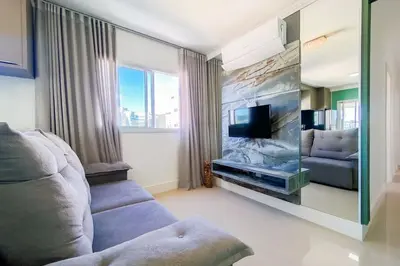 Uma televisão e/ou sistema de entretenimento em Refúgio a 200m - Praia de Palmas - 0301