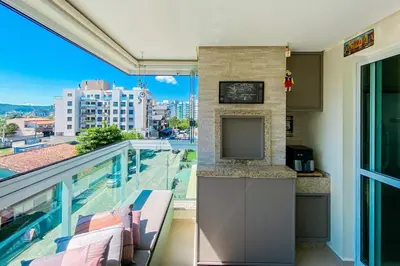Uma varanda ou terraço em Refúgio a 200m - Praia de Palmas - 0301