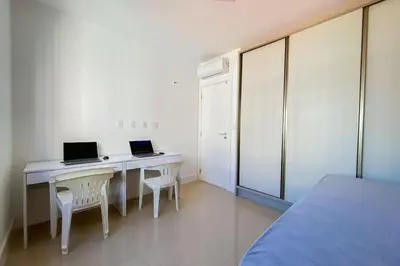 Uma cama ou camas num quarto em Refúgio a 200m - Praia de Palmas - 0301