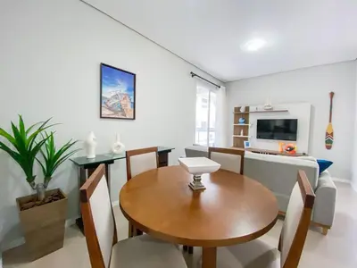 Uma televisão e/ou sistema de entretenimento em Descanse na praia de Palmas, 450m do Mar - 0103