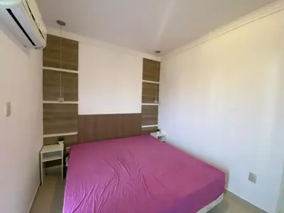 Uma cama ou camas num quarto em Vista Mar - Praia de Palmas - 80m da Praia - Piscina e Lazer Completo! 0475