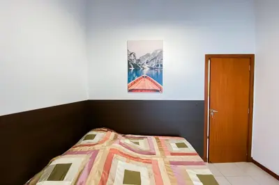 Uma cama ou camas num quarto em Amplo apartamento há 150 metros do mar na Praia de Palmas! 0318