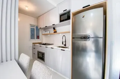 A cozinha ou kitchenette de Praia de Palmas - Apto 300m da Praia, 2 Dorms - 0158