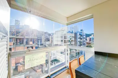 Uma varanda ou terraço em Praia de Palmas - Apto 300m da Praia, 2 Dorms - 0158
