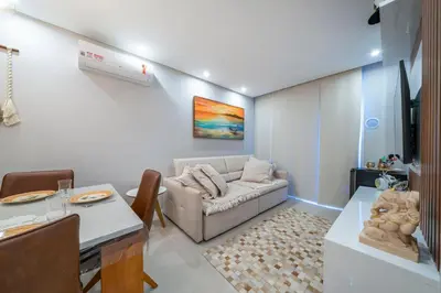 Uma área de estar em Apto elegante a 100m da praia MD8752