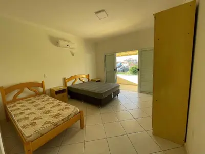 Uma cama ou camas num quarto em cód 15 - Casa espetacular em Palmas